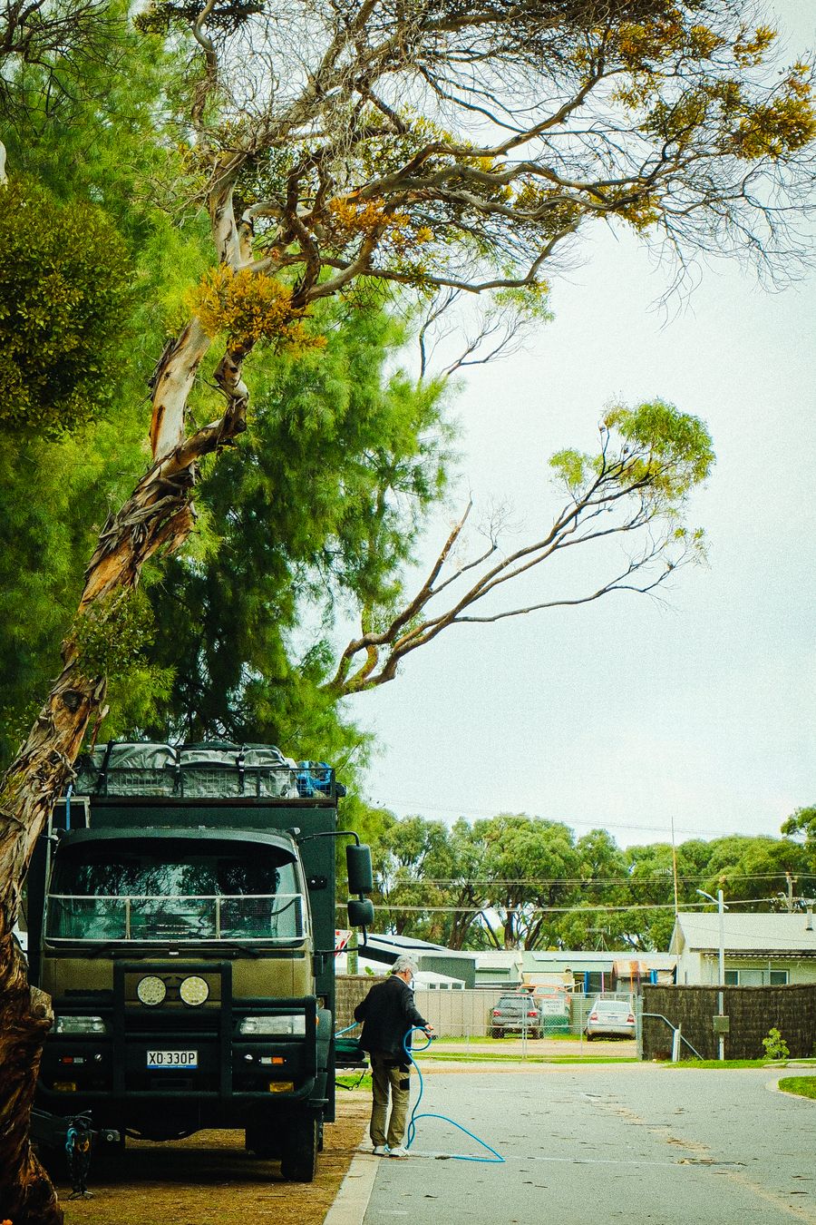 Man preparing camper at campsite