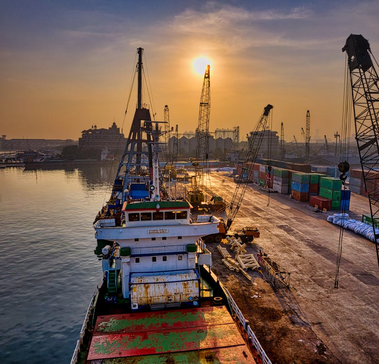 White and Green Cargo Ship