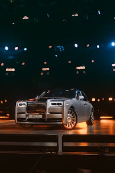 Captured in vibrant lighting, this Rolls Royce Phantom exudes style and luxury in Mumbai.