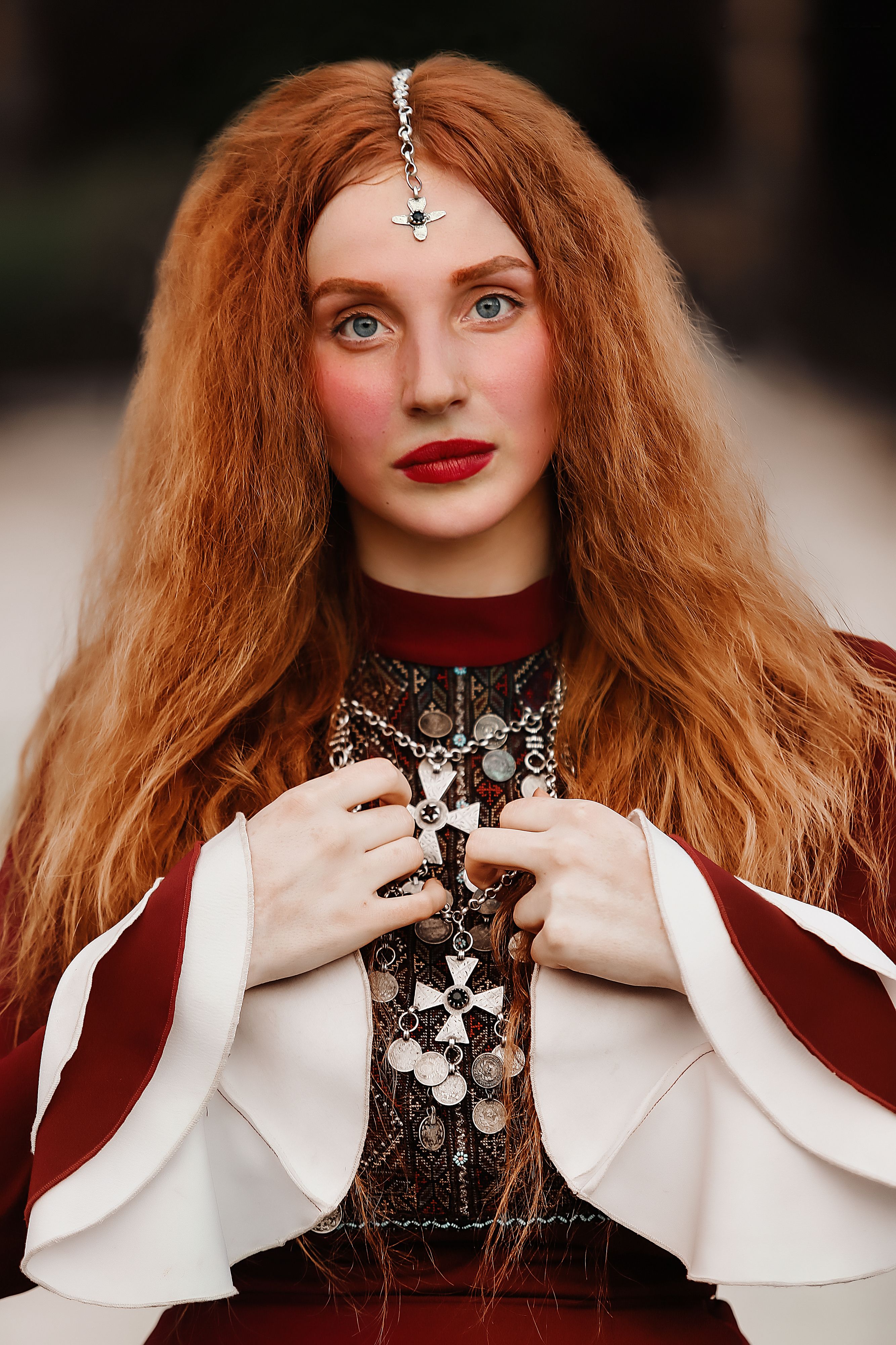 Stunning portrait of a woman with medieval fashion influences, highlighting elegant details in Tbilisi.
