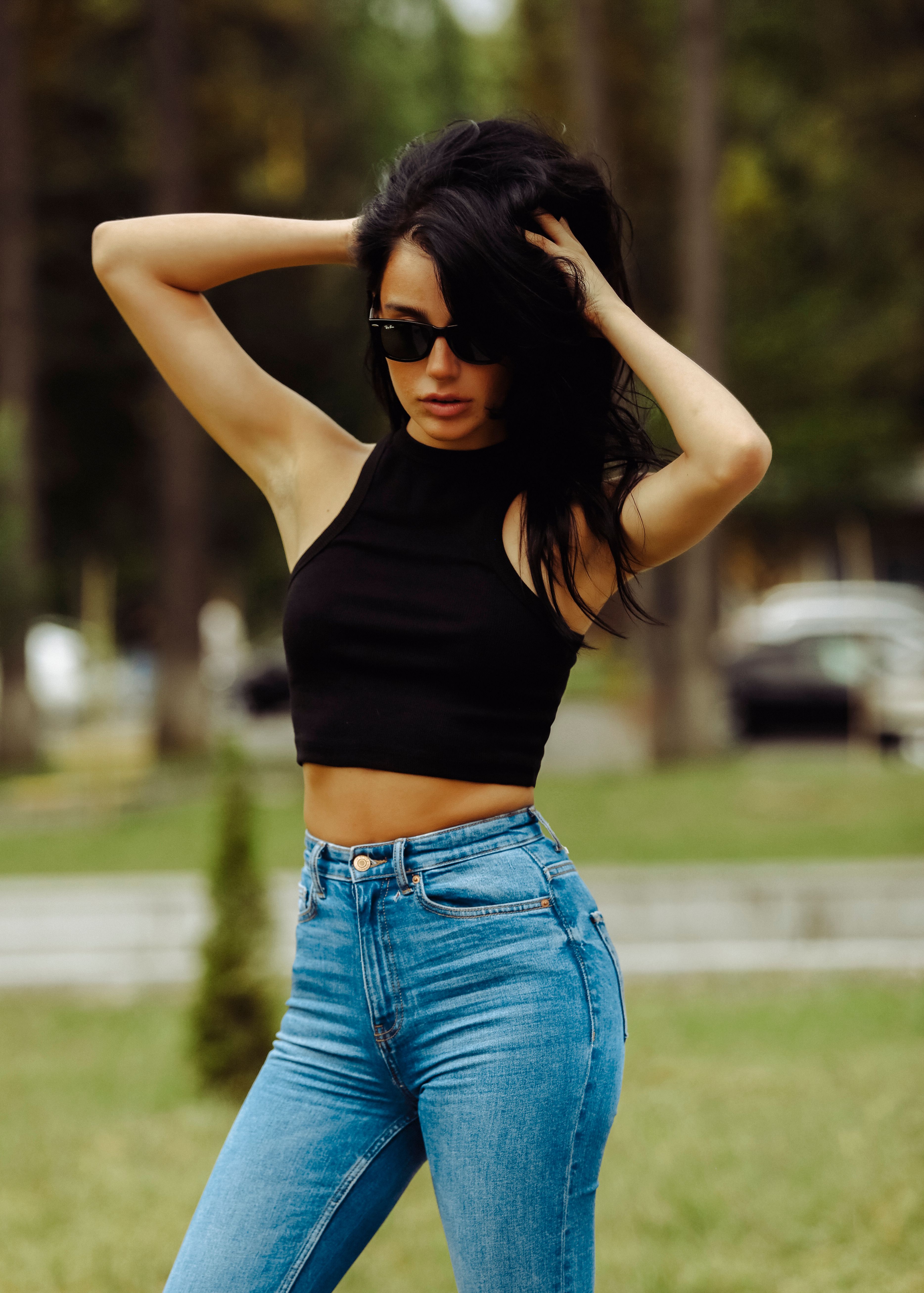 Stylish Woman Posing Outdoors in Casual Outfit · Free Stock Photo