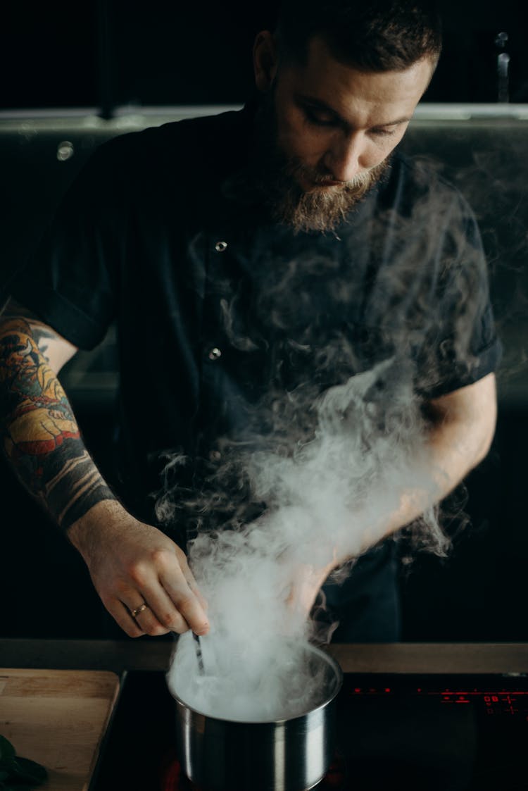 A Chef Busy Cooking 