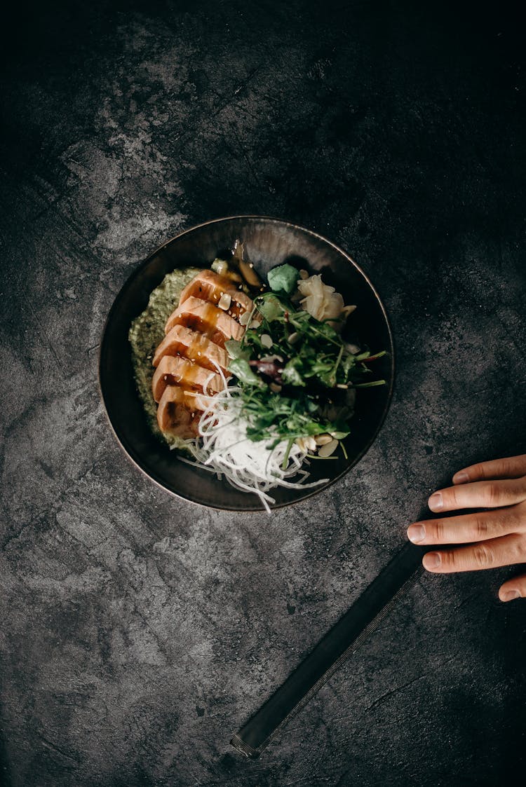 Photo Of Person Touching Chopsticks