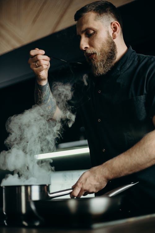 Free Chef Checking The Taste Stock Photo