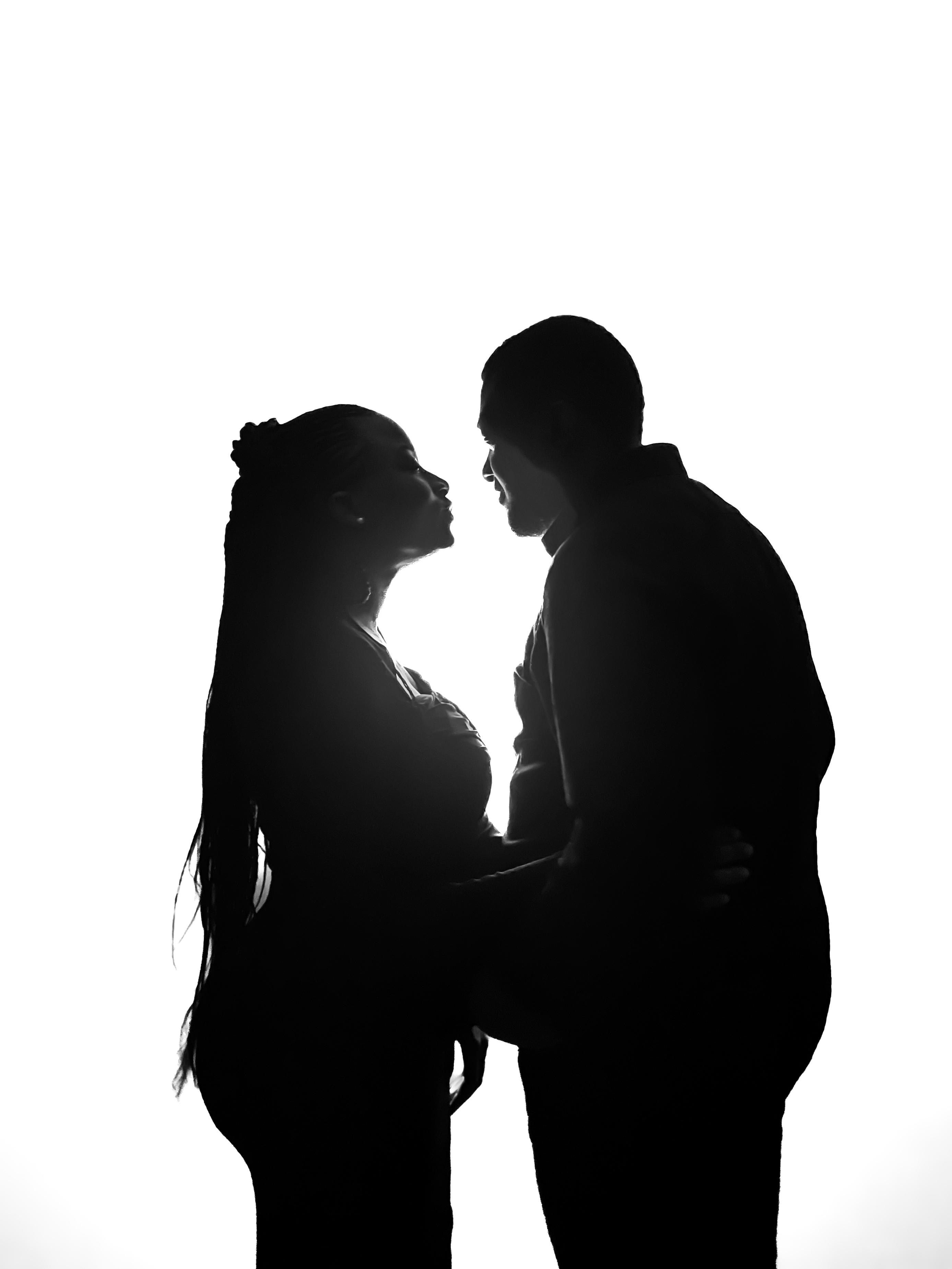 Romantic Silhouette of Couple Embracing · Free Stock Photo