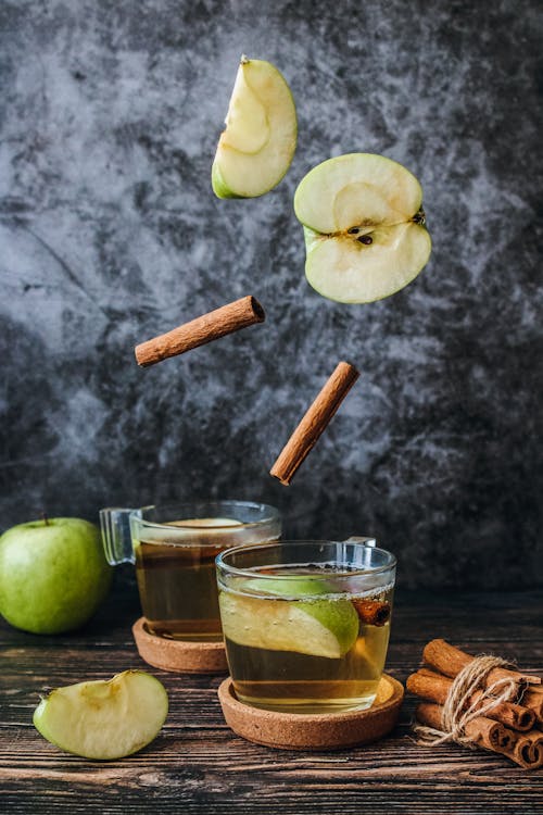 Free Photo of Slice Green Apple and Cinnamon Stick  Stock Photo