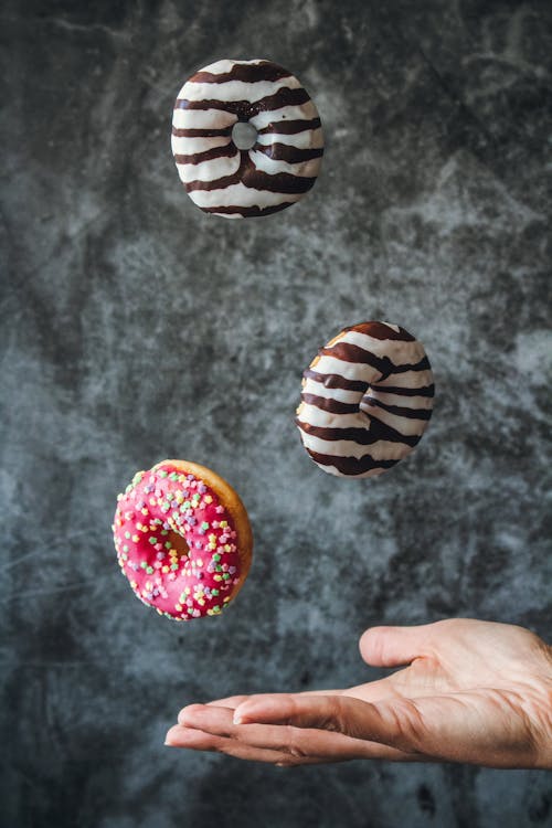 Photo Of Donuts In Mid Air