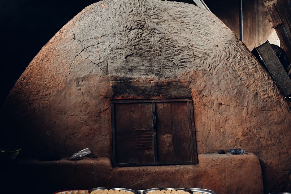 Photo by Finalchoice on Pexels A traditional clay oven in a rustic setting showcasing culinary heritage and artisanal craftsmanship.