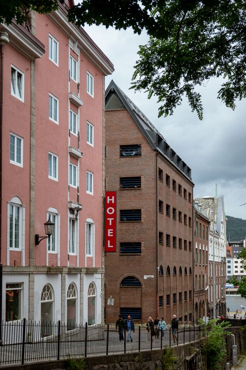 Free Street scene in Bergen, Norway, featuring classic architecture and a vibrant atmosphere. Stock Photo