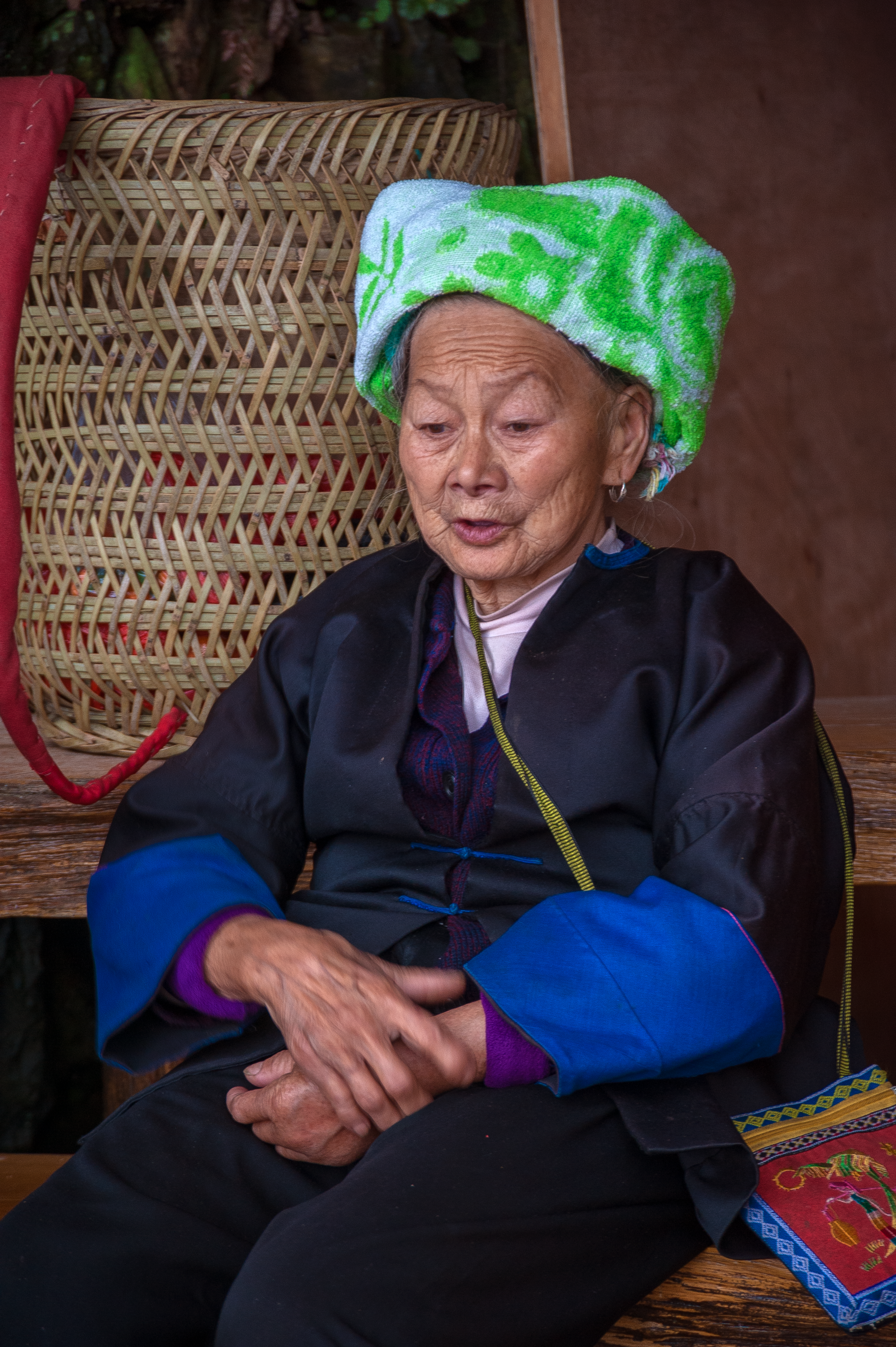 Elderly Woman in Traditional Guangxi Attire · Free Stock Photo