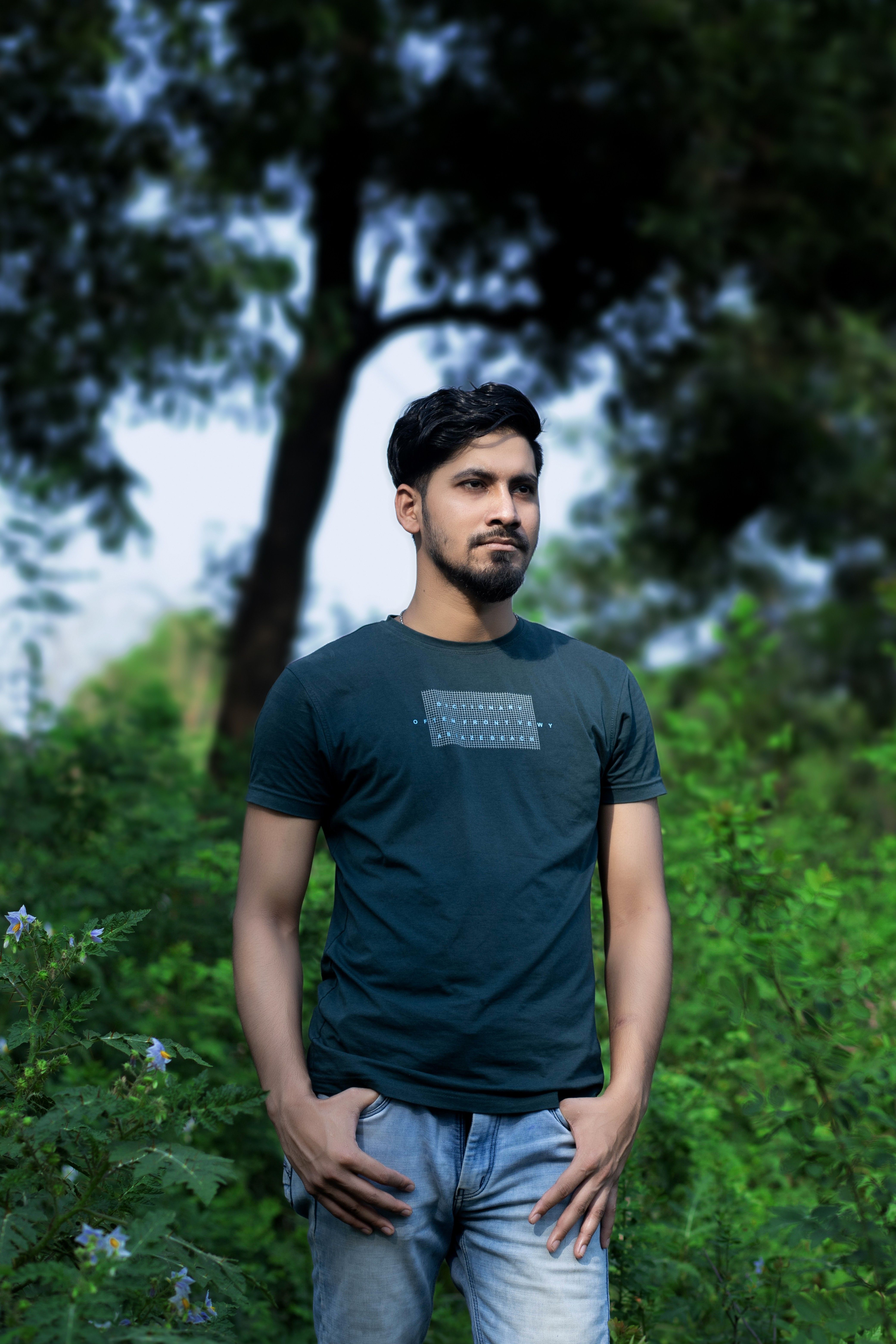 Portrait of a Young Man Outdoors in Nature · Free Stock Photo