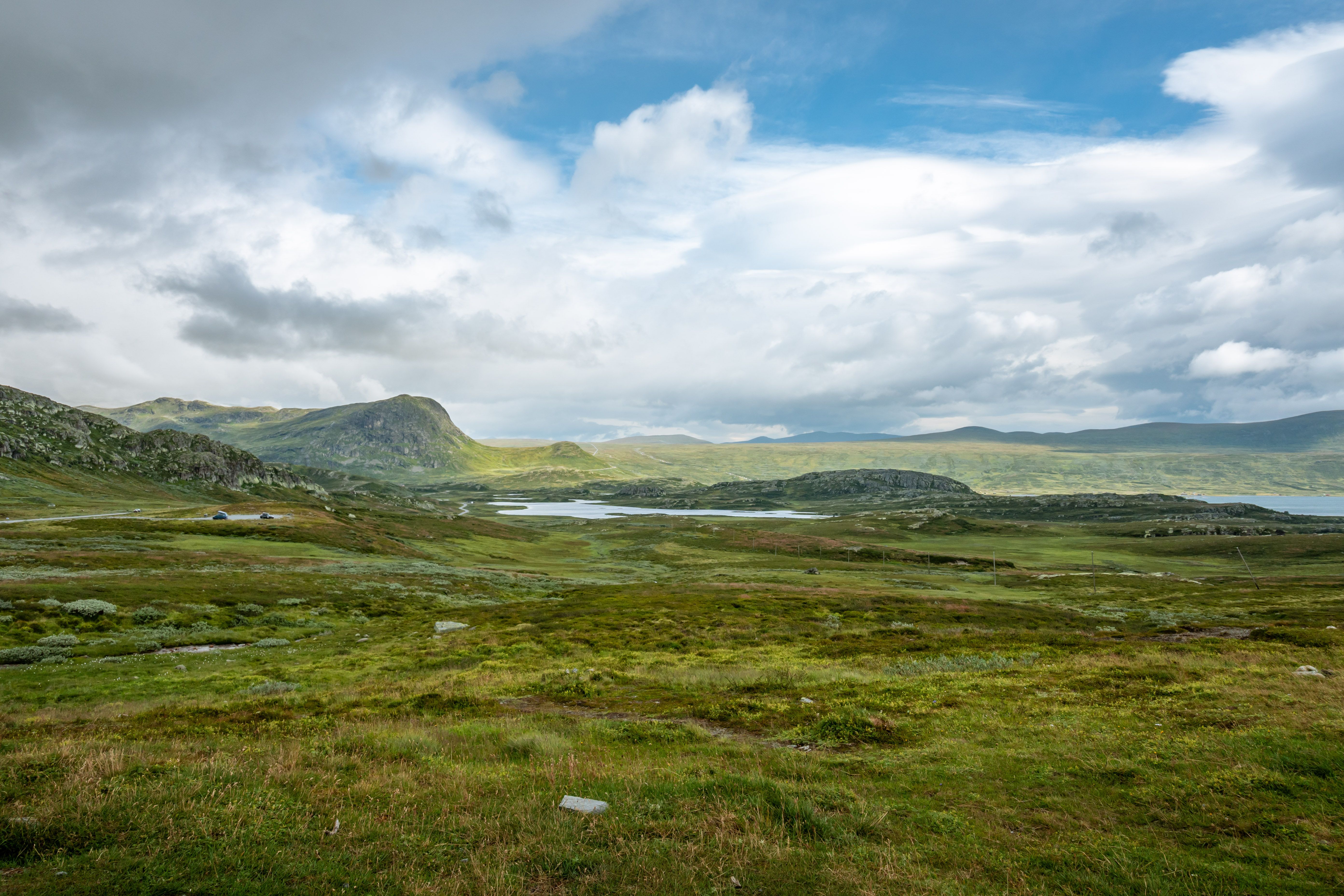 Breathtaking landscape view of mountains and sky in Innlandet, Norway.