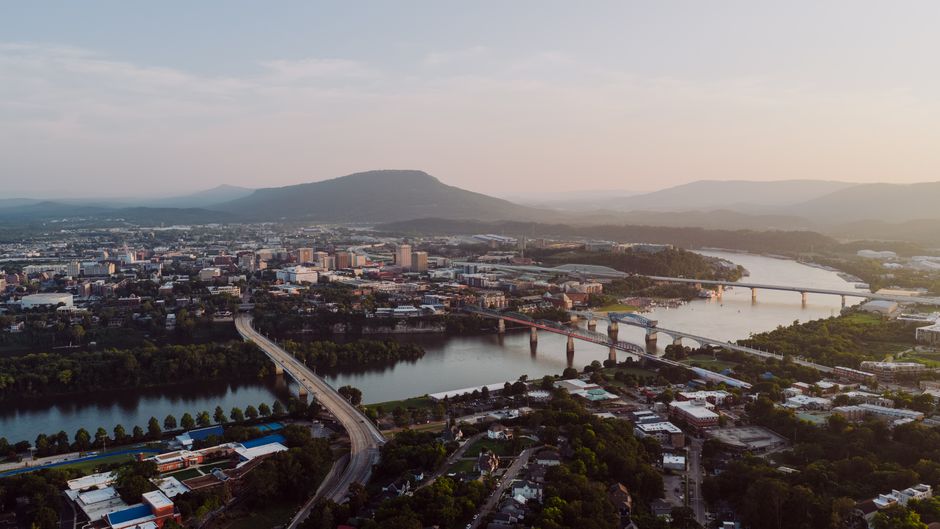 Unbeatable Downtown Nashville Helicopter Tour Review: Soaring Over Music City's Iconic Skyline Review 2026 - Aerial view of Chattanooga, Tennessee featuring bridges, river, and downtown skyline.