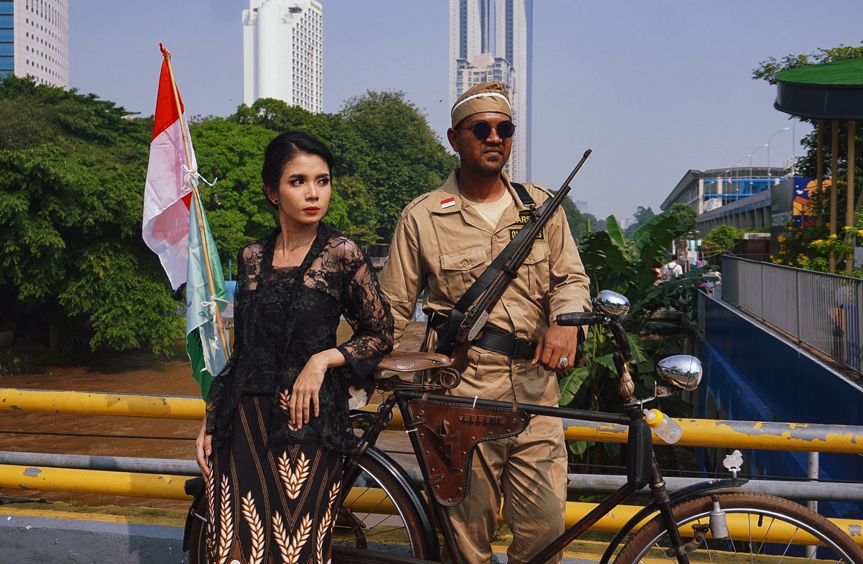 Historical Costume Scene in Jakarta with Vintage Bicycle
