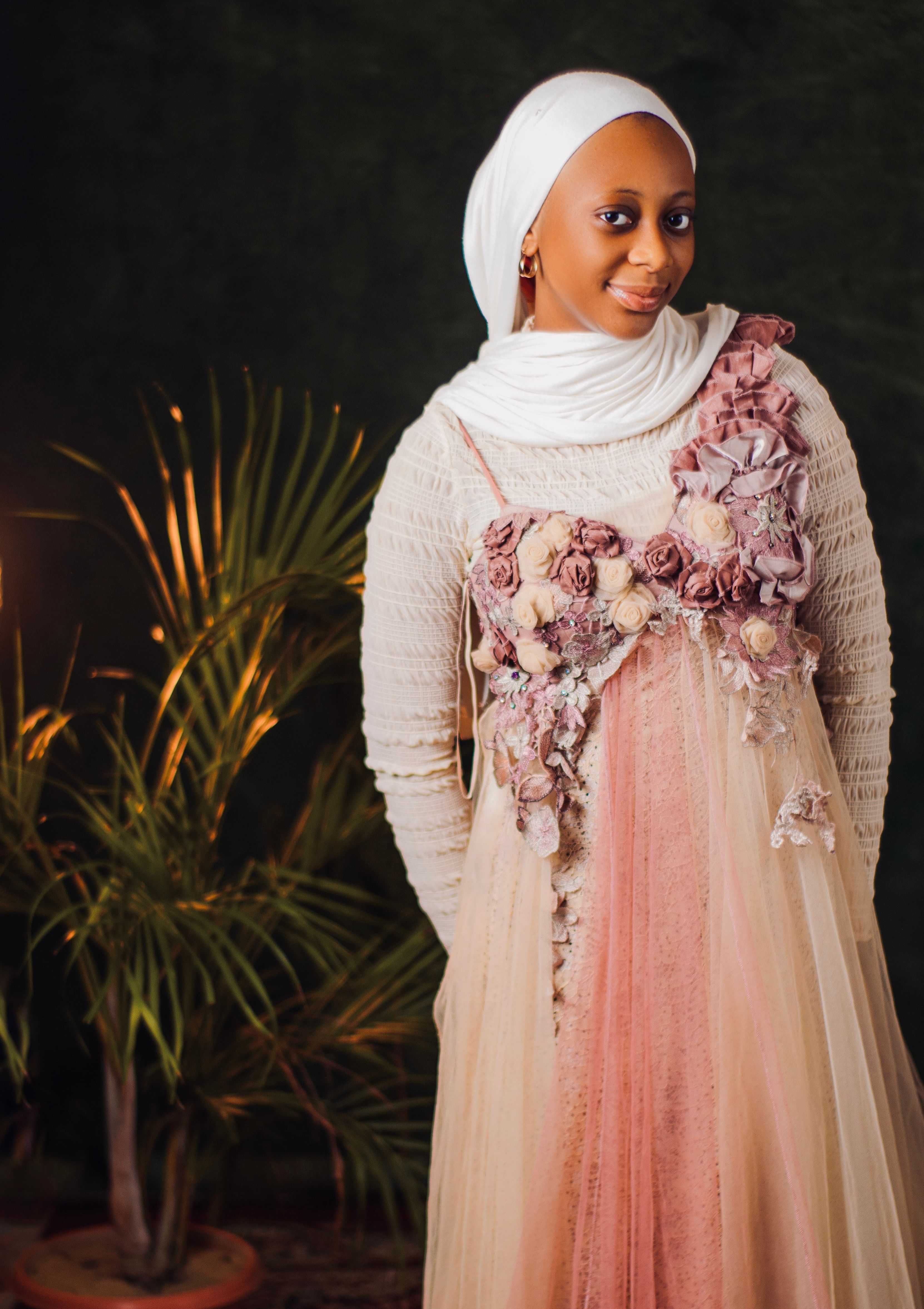 Elegant Woman in White Lace Dress and Hijab Indoors  Free Stock Photo