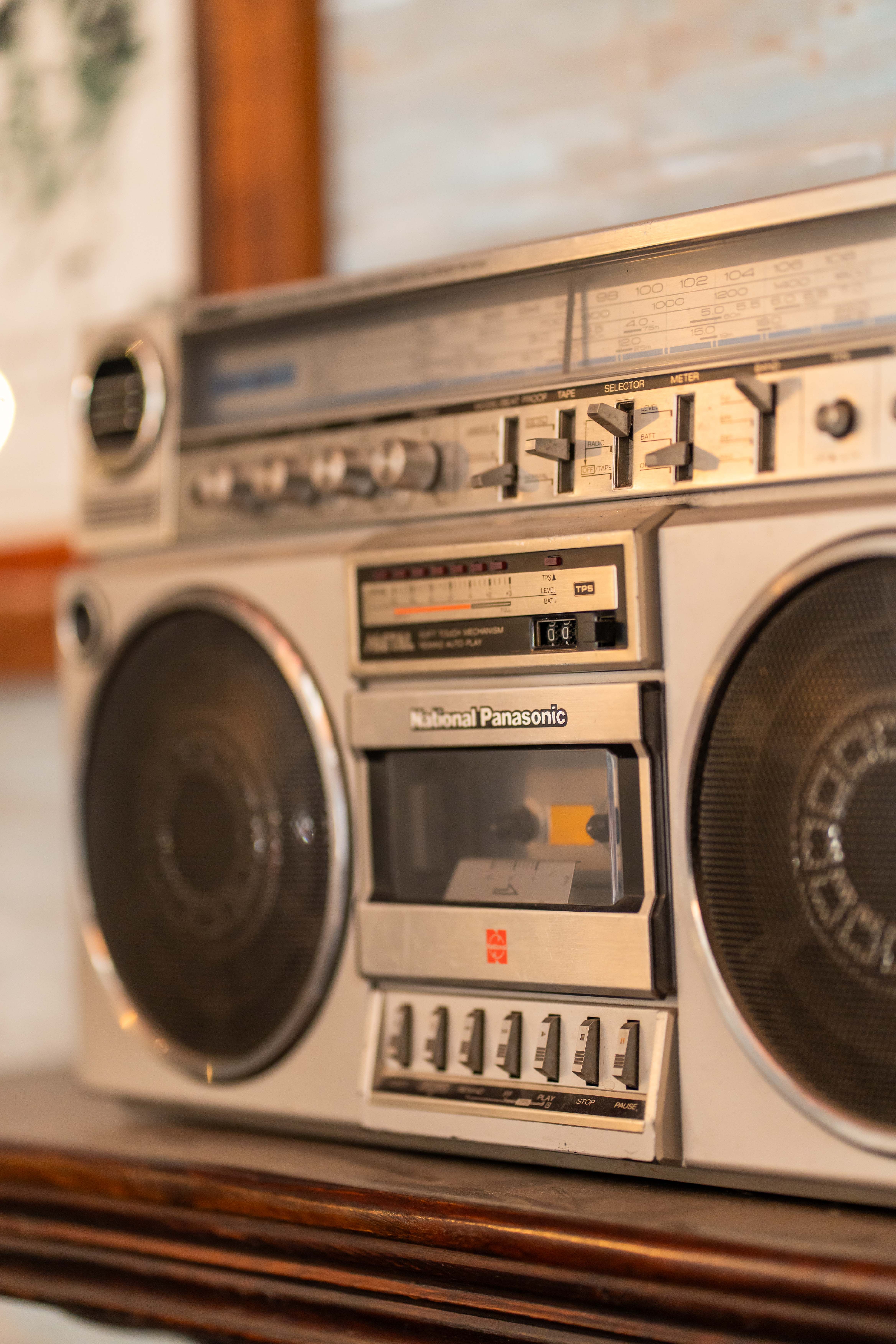 Vintage Boombox on Wooden Surface · Free Stock Photo