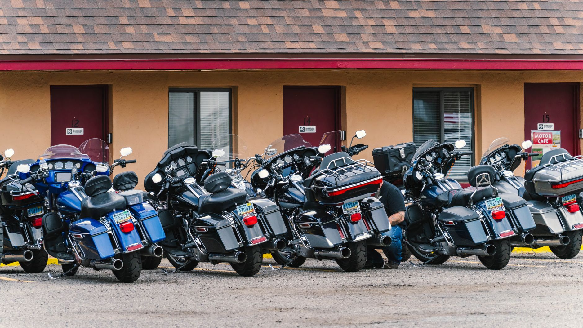Row of motorcycles loaded for enclosed transport — Canadian motorcycle shipping service
