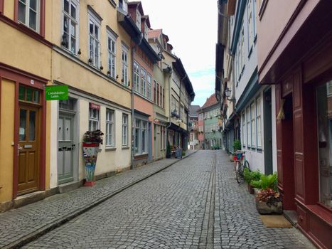 Picturesque cobblestone street in the historic old town of Erfurt, Thuringia, Germany.