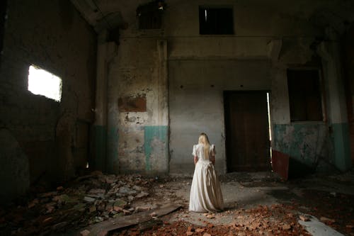 Free Woman Inside Abandoned Room Stock Photo