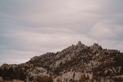 Free Gray Mountains Under Cloudy Sky Stock Photo