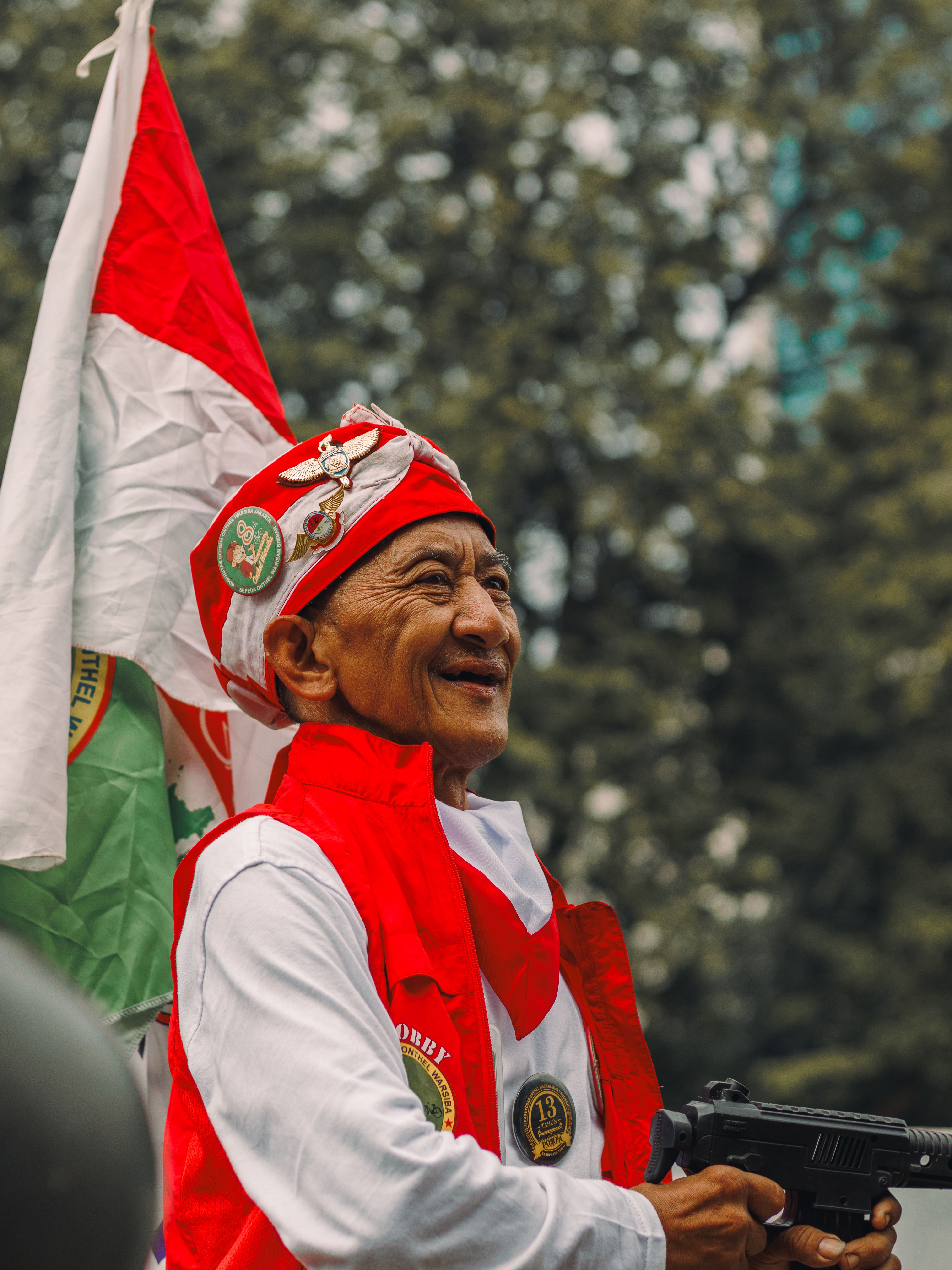 Elderly Man in Vibrant Traditional Costume Celebrates