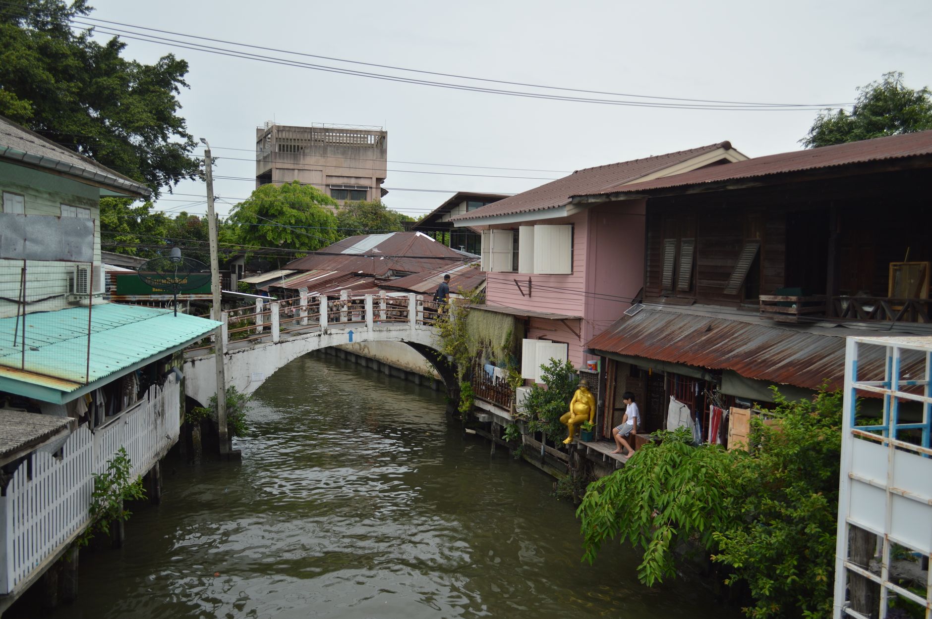 Traditional teak Thai houses of the Jim Thompson museum by the khlong