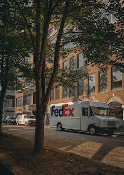 FedEx truck making a delivery in a quiet alley in Halifax, Nova Scotia.