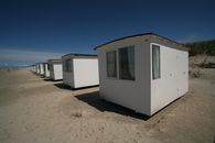 White Sheds on Gray Sands