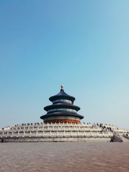 The iconic Temple of Heaven in Beijing, China, stands majestically under a clear blue sky.