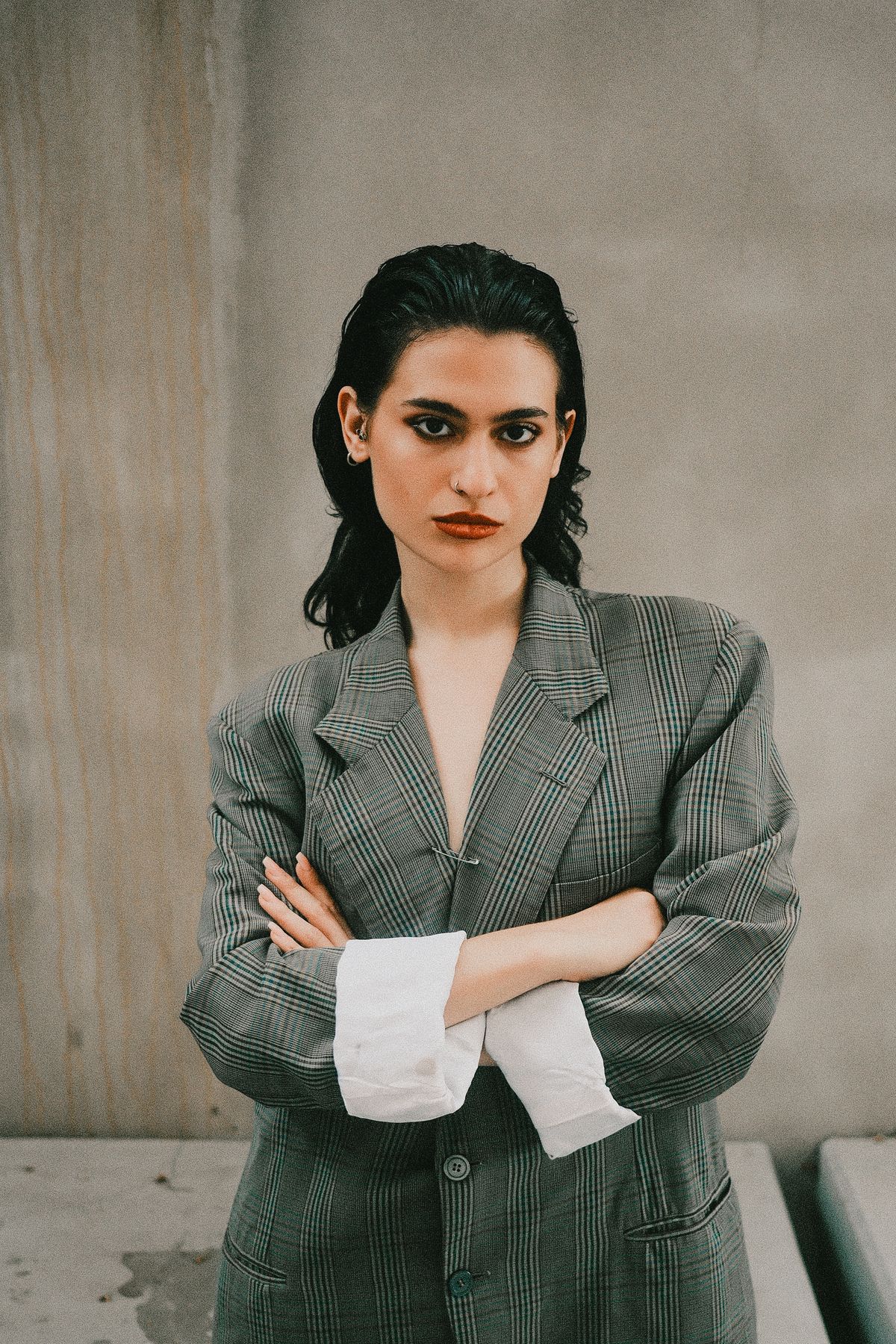 A confident woman in an oversized blazer — the double-breasted summer suit