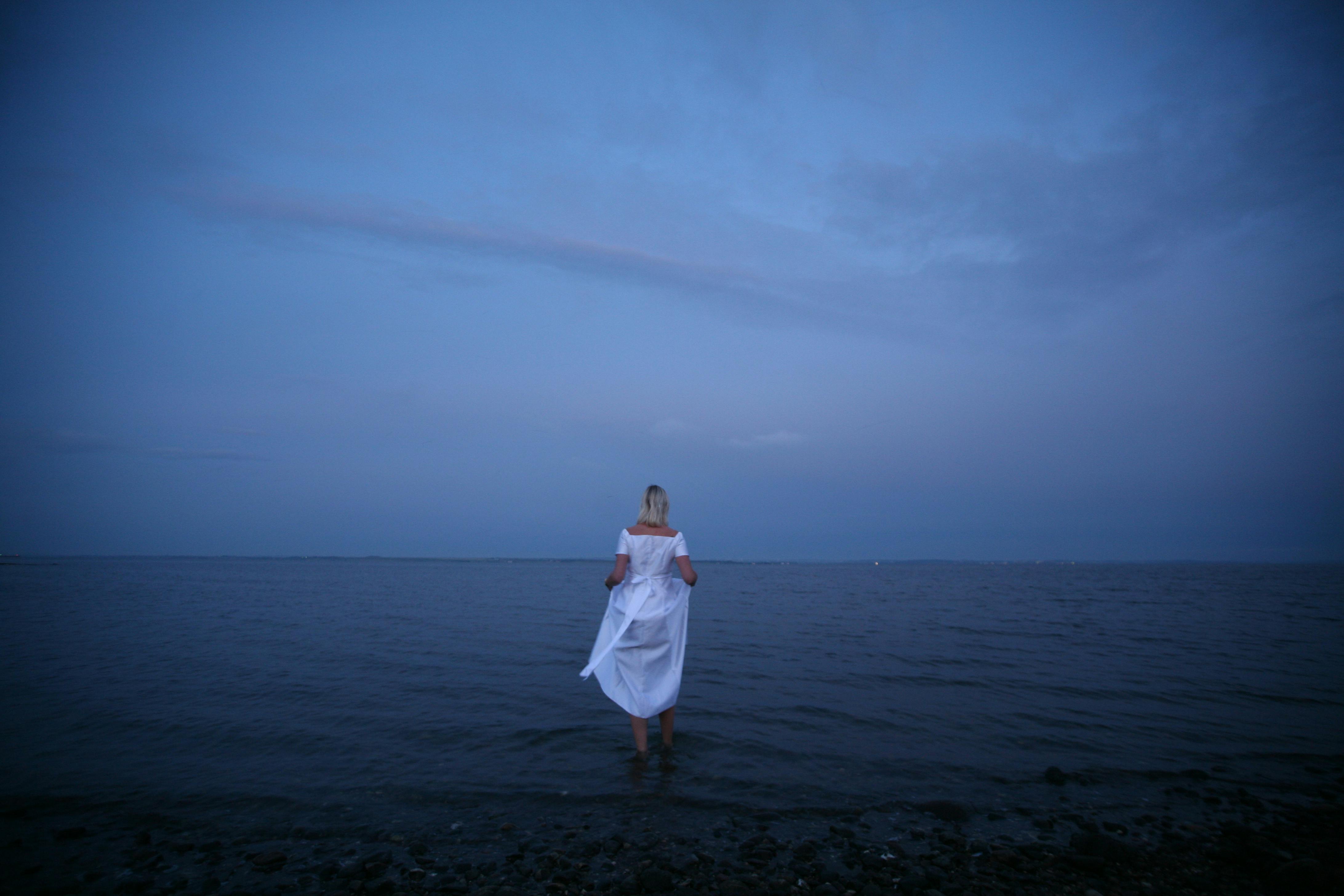 Woman Standing on Shoreline � Free Stock Photo image