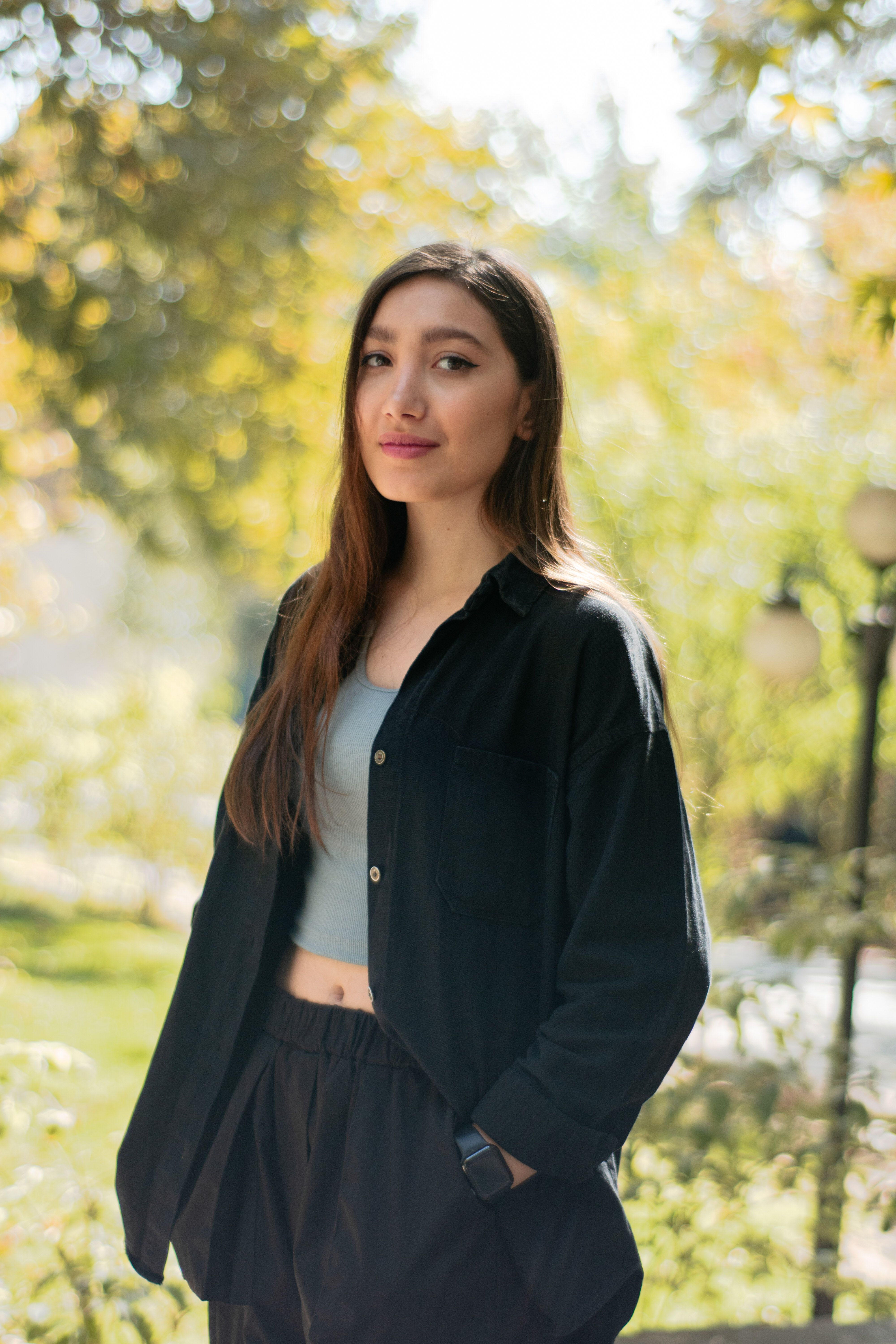 Portrait of a Young Woman in Tehran Park · Free Stock Photo