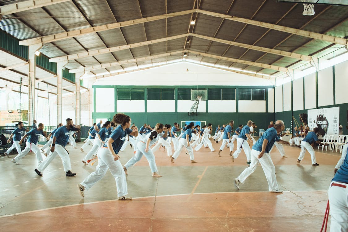 Flowing motions mark the unique moves of capoeira. Photo from Pexels.