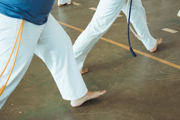 Instructor demonstrating a technique to a student