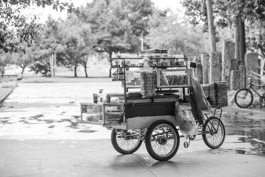 Black and white photo of a street food cart in a park in Rio de Janeiro, Brazil.