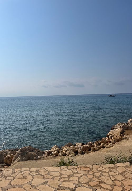 Free Peaceful coastline view of the Mediterranean Sea from Kızkalesi, Mersin, Türkiye. Stock Photo