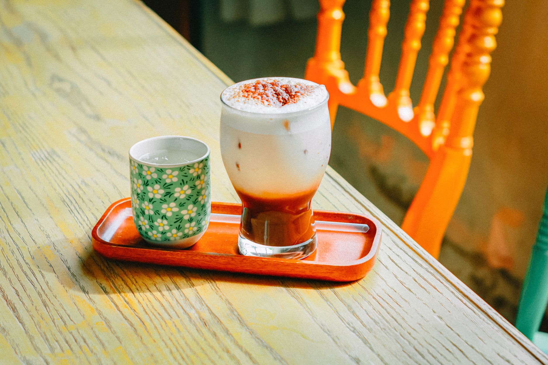 Freshly made iced cappuccino with foam
