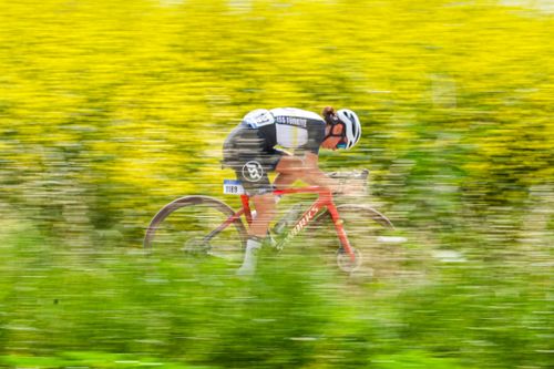 Free Dynamic motion shot of a cyclist racing through colorful fields in Bursa, Türkiye. Stock Photo