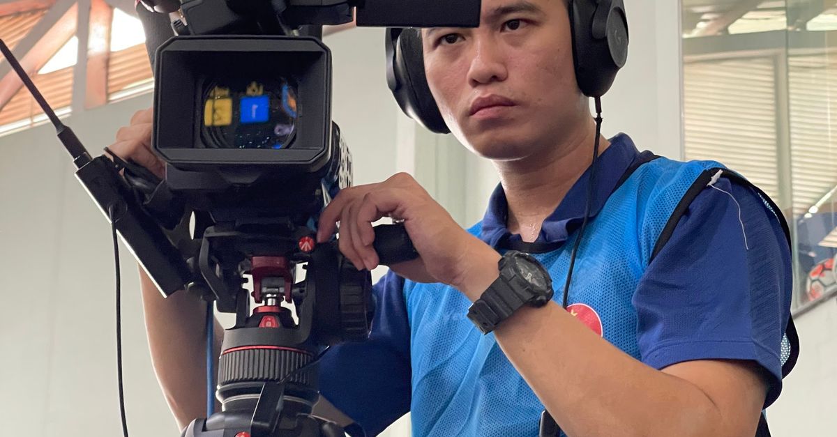 Operational Camera Cameraman Operating Professional Video Camera Indoors · Free Stock Photo