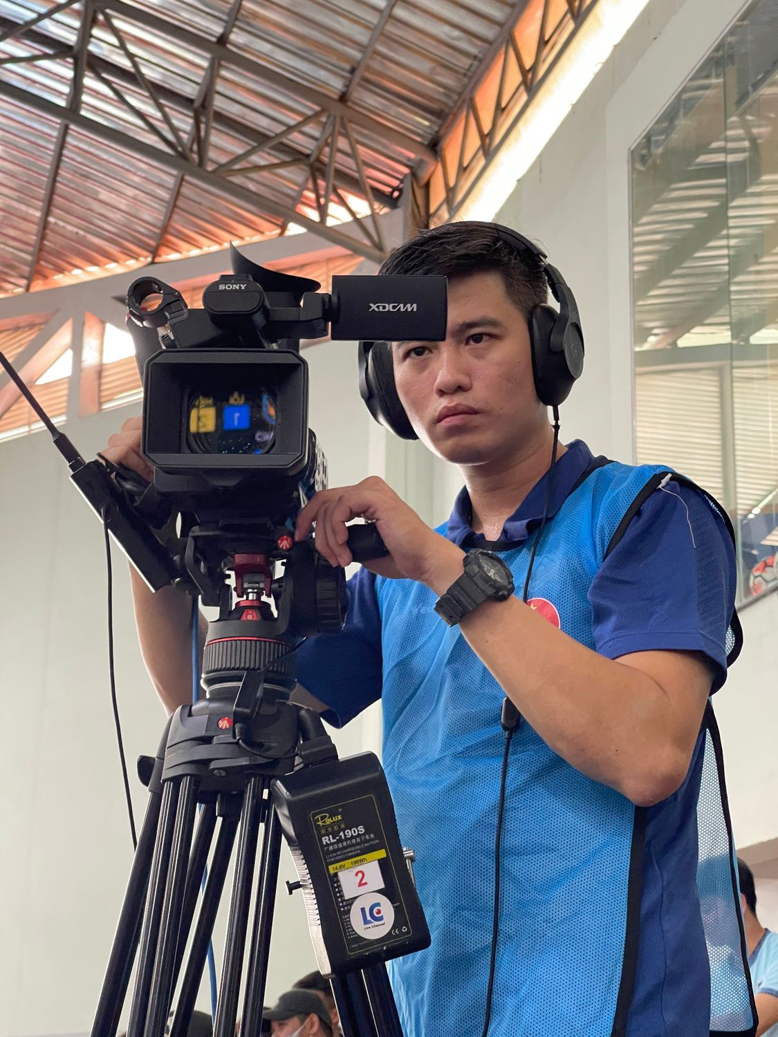 Operational Camera Cameraman Operating Professional Video Camera Indoors · Free Stock Photo