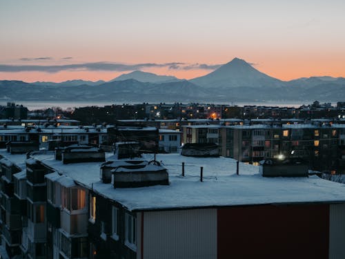 Immagine gratuita di architettura. città, cielo al tramonto, luci della città