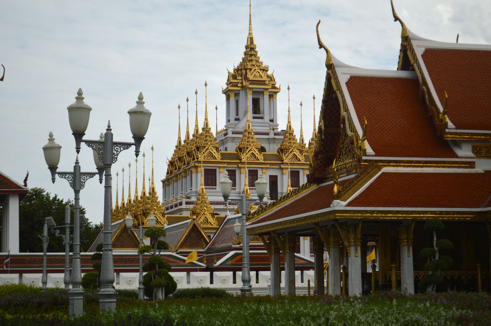 Wat Ratchanatdaram temple with golden spires in Bangkok