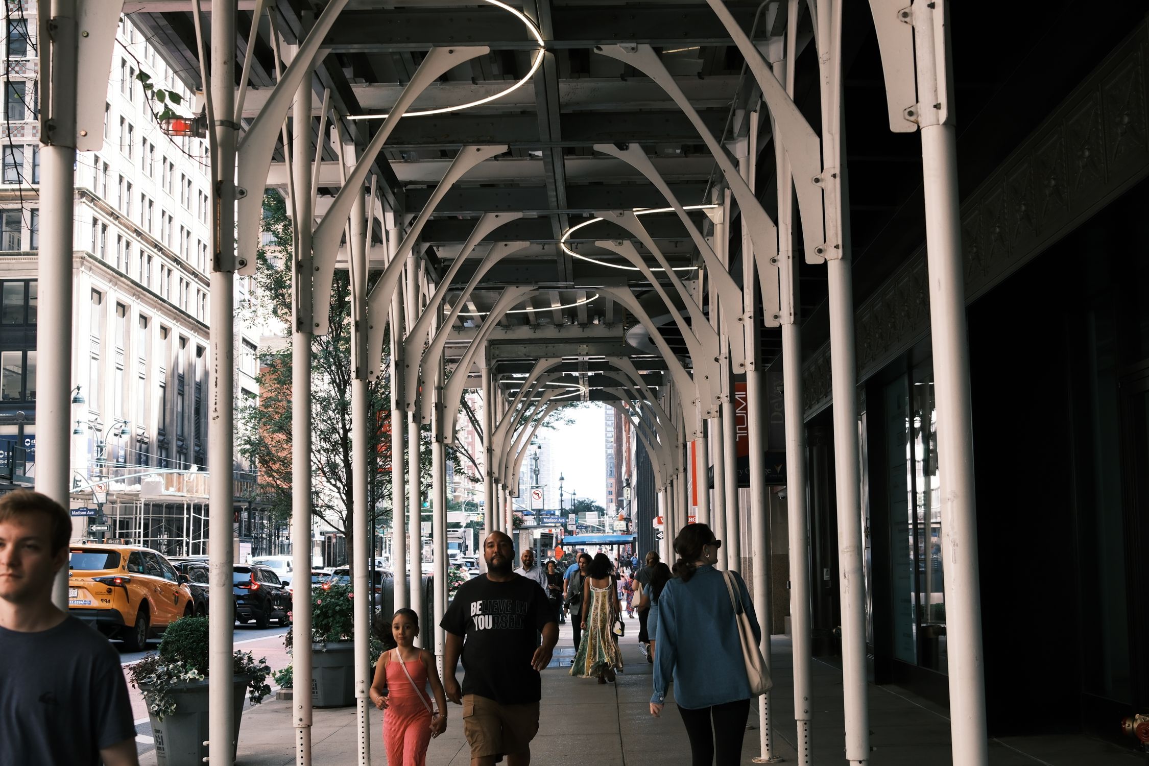 Urban Street Scene with Pedestrians and Architecture · Free Stock Photo