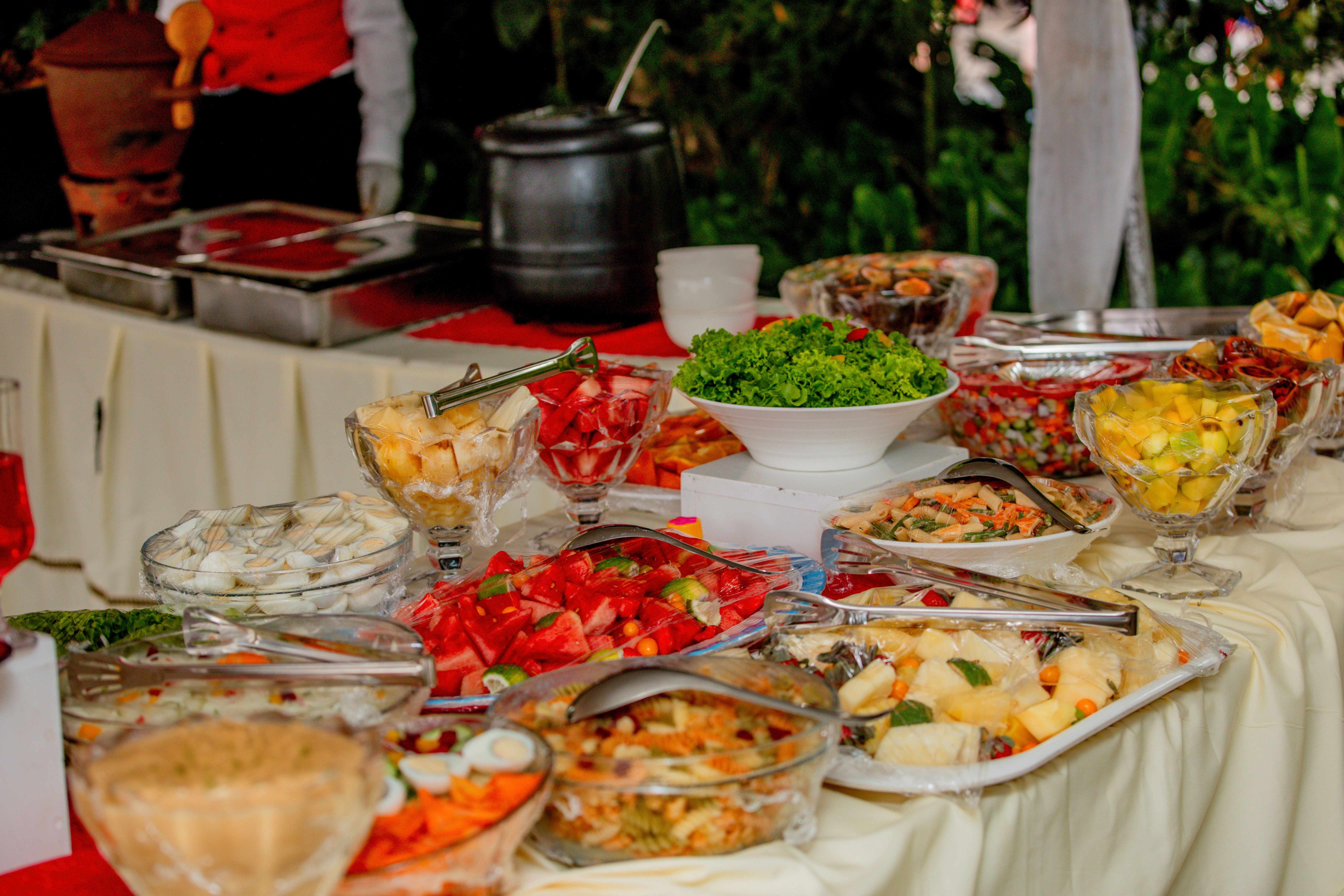 Colorful buffet with fresh fruits and salads · Free Stock Photo