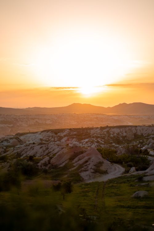 Free Stunning sunset view over the unique rocky formations in Cappadocia, Turkey. Stock Photo