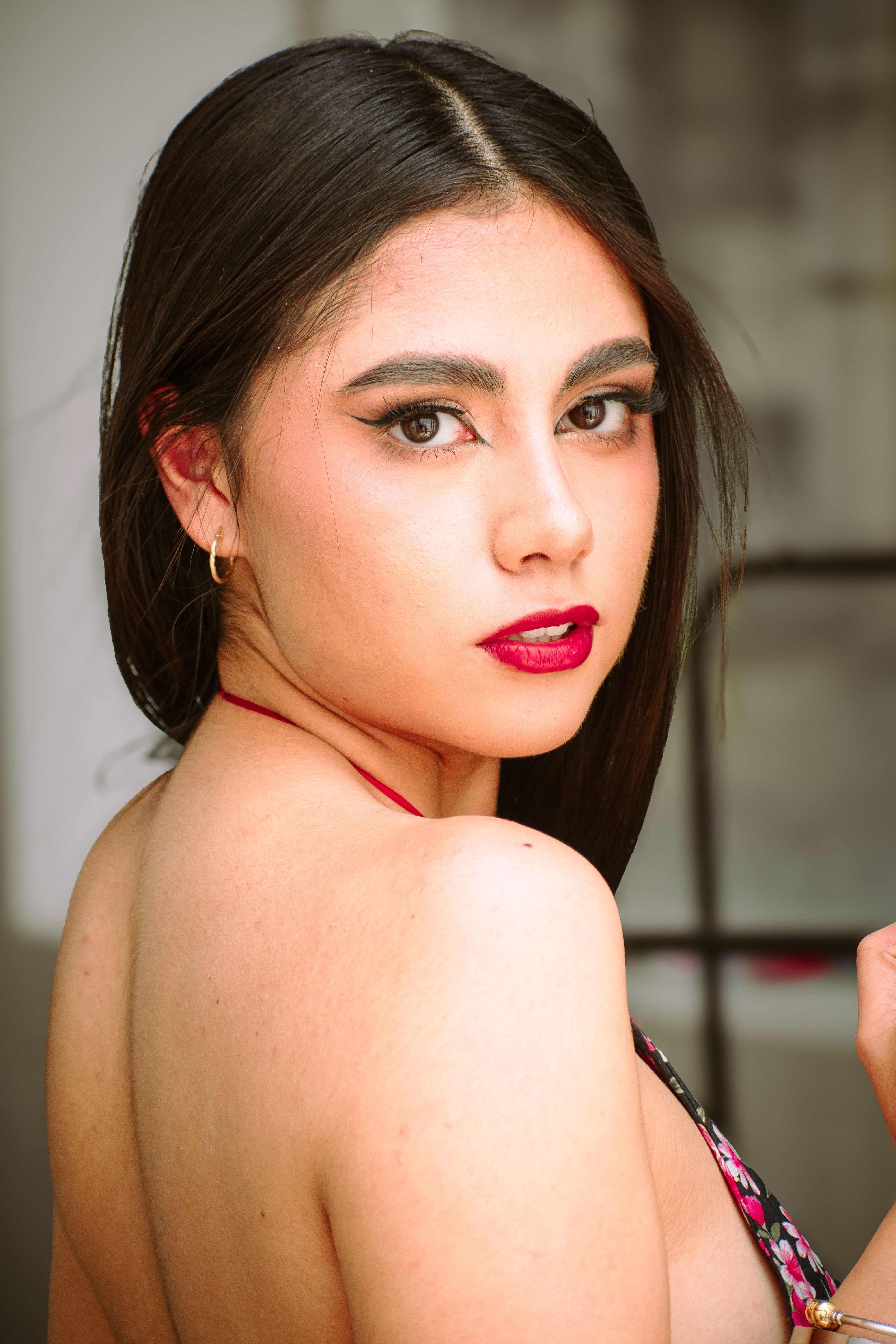 Stunning portrait of a woman with bold makeup indoors in Mexico City.