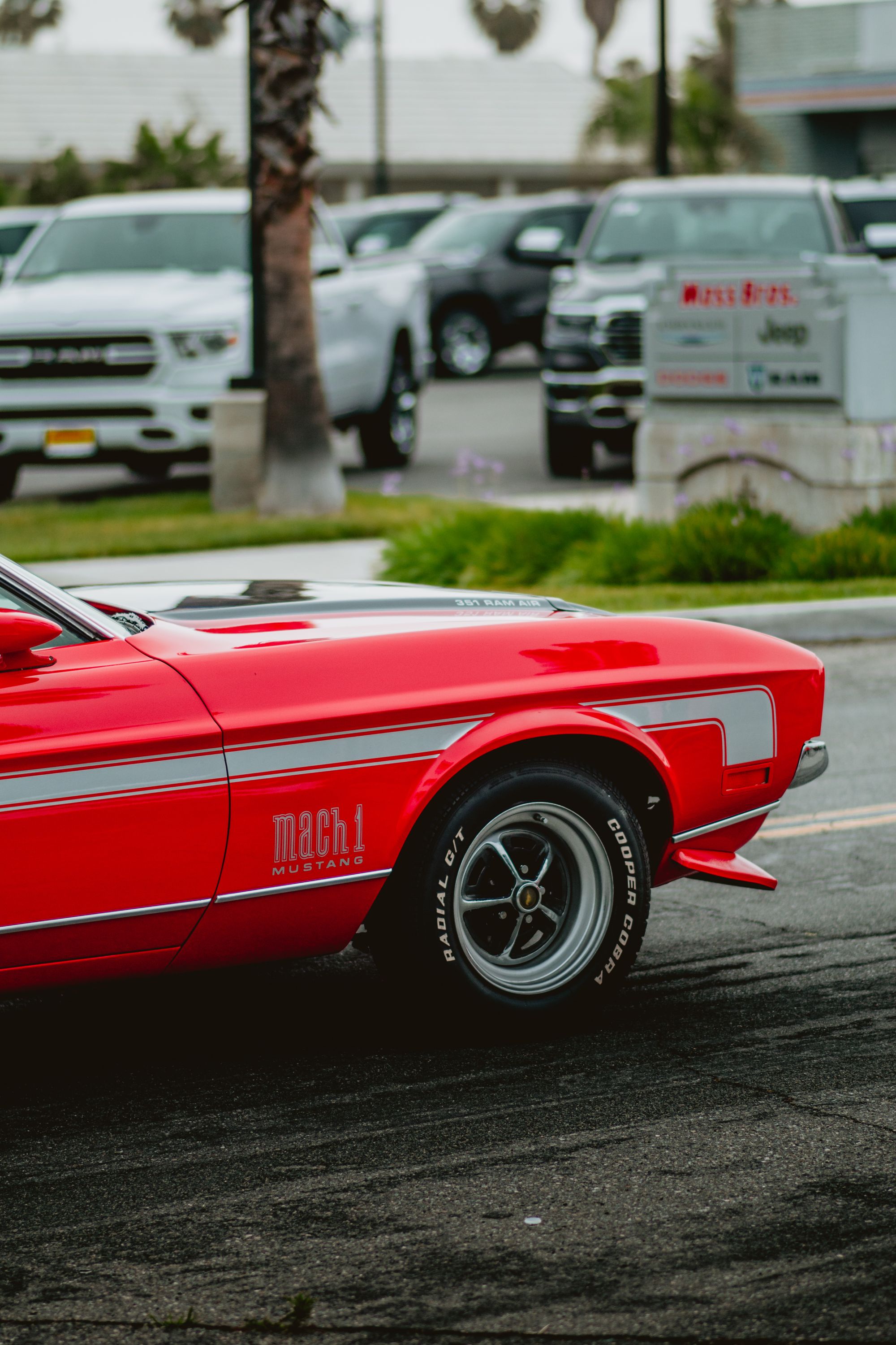 Image 4 explicitly shows a classic Ford Mustang Mach 1 with the 
