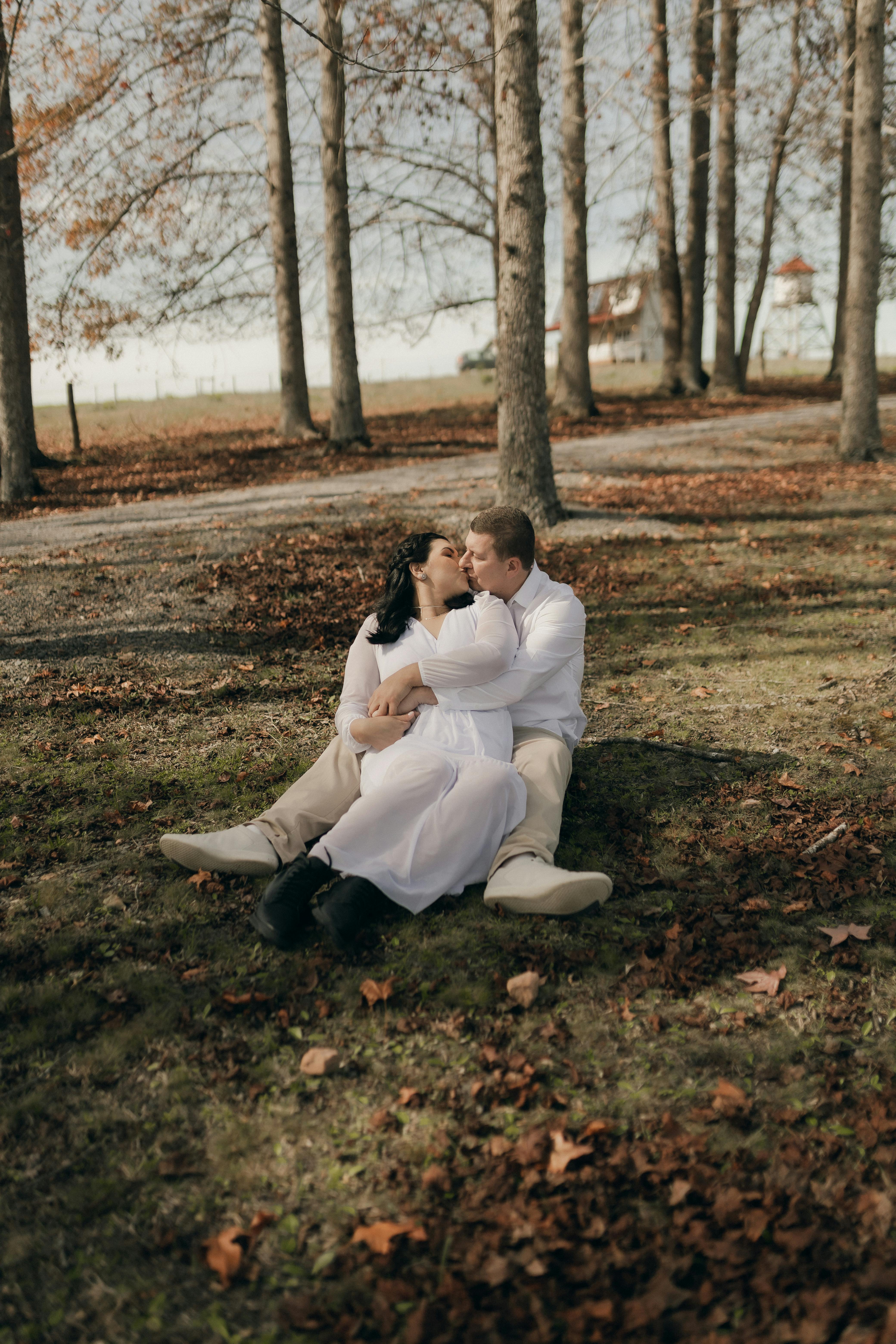 Romantic couple embracing intimately in soft warm light, bodies close in tender connection