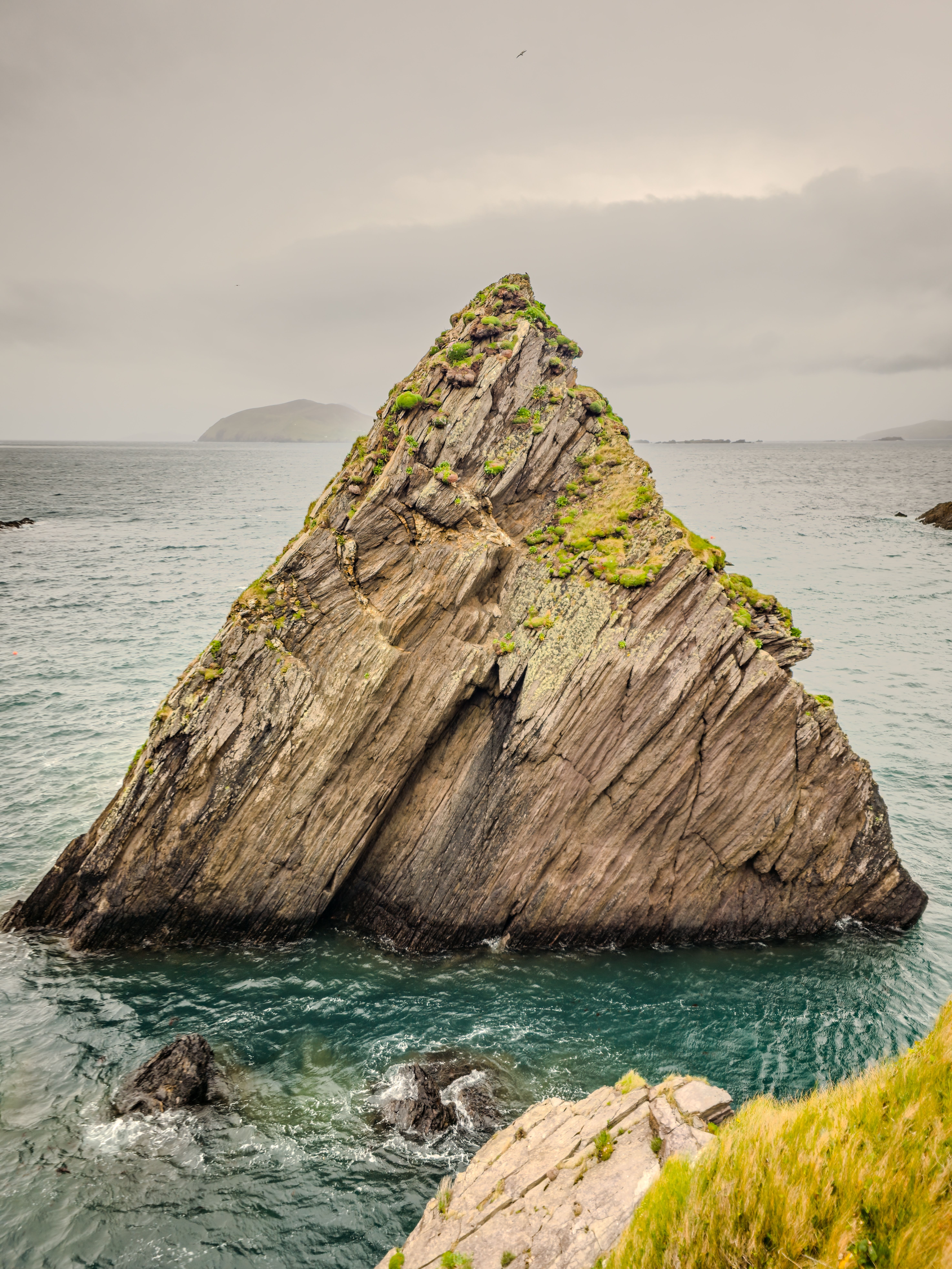 Sea stack rising out of the water off the Dingle Peninsula in County Kerry