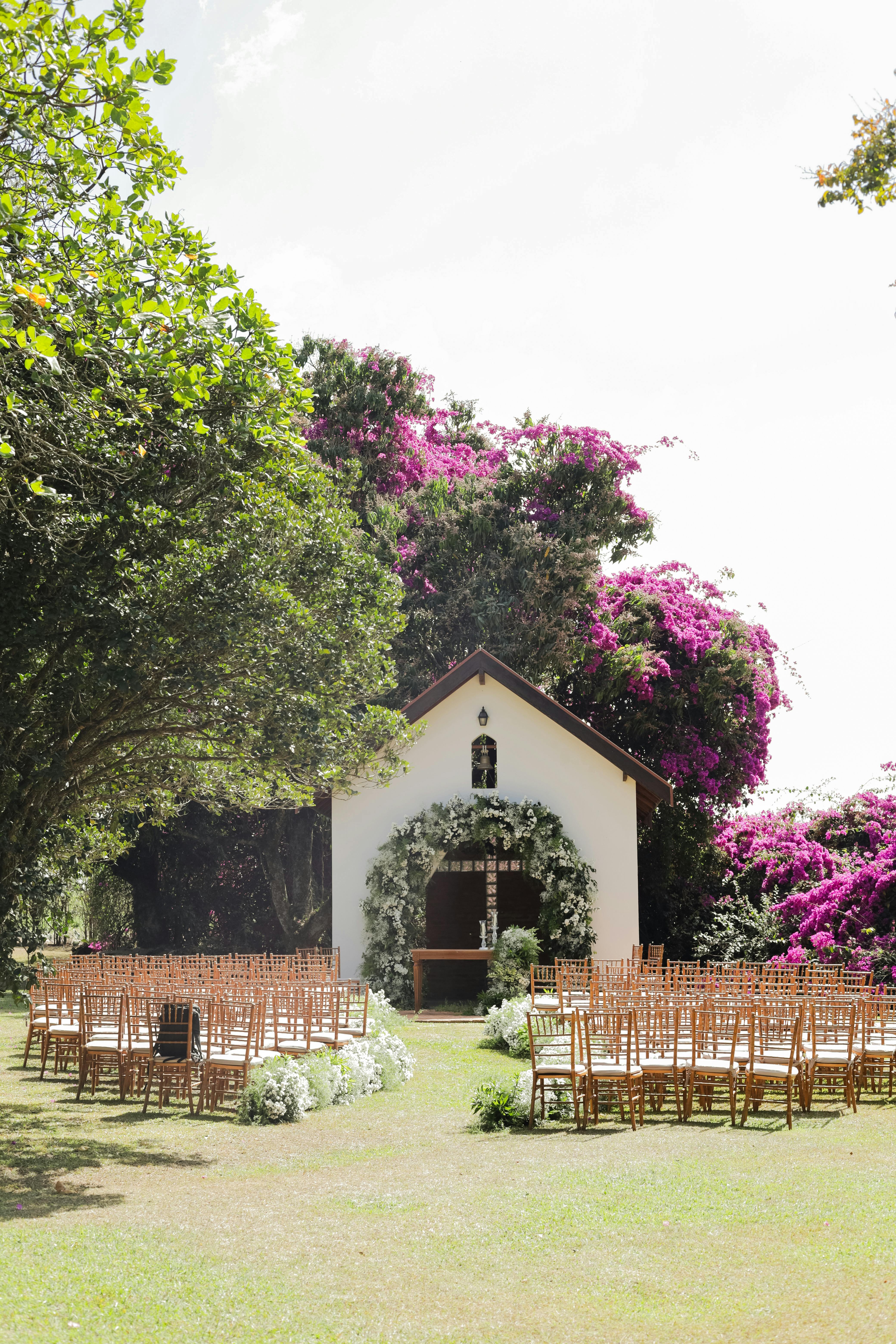 Beautiful outdoor wedding ceremony setup with floral decor in São Paulo, Brazil.